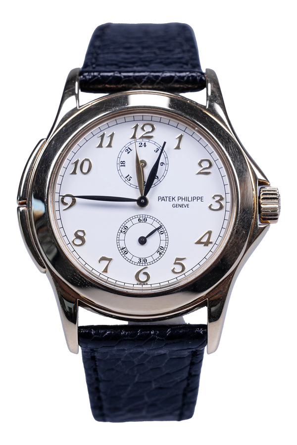 Patek Philippe Travel Time 5134J — weißes Zifferblatt, Gelbgoldgehäuse, Lederband